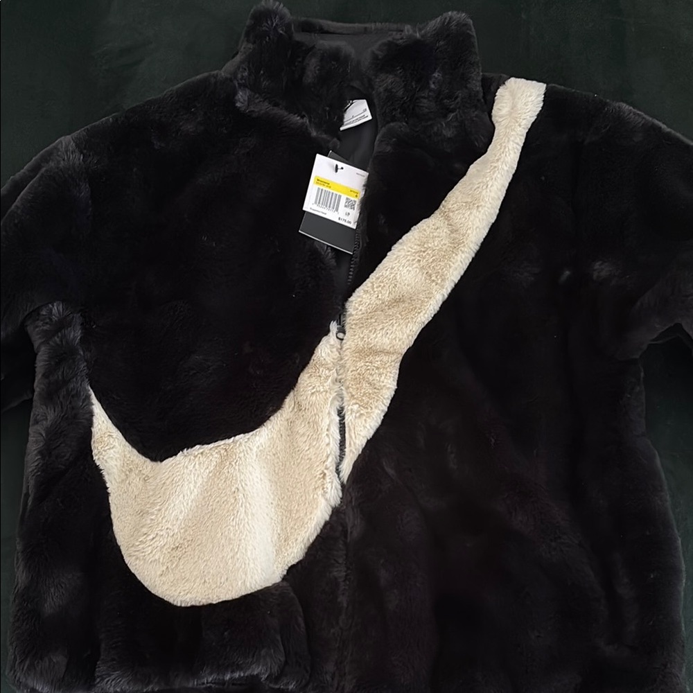 Nike Black and Cream Puffer Jacket with Oversized Swoosh